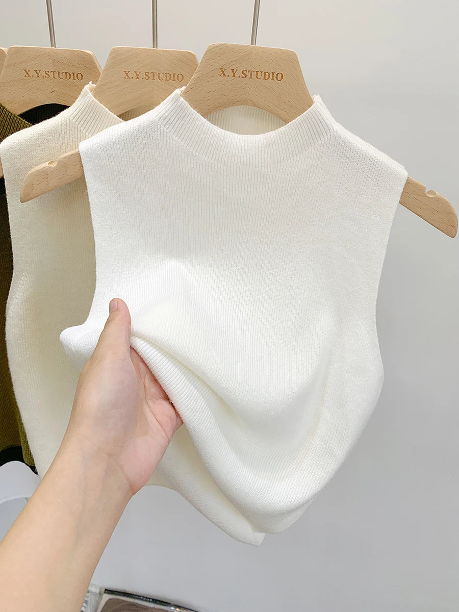 Ribbed Sleeveless High Neck Knit Top